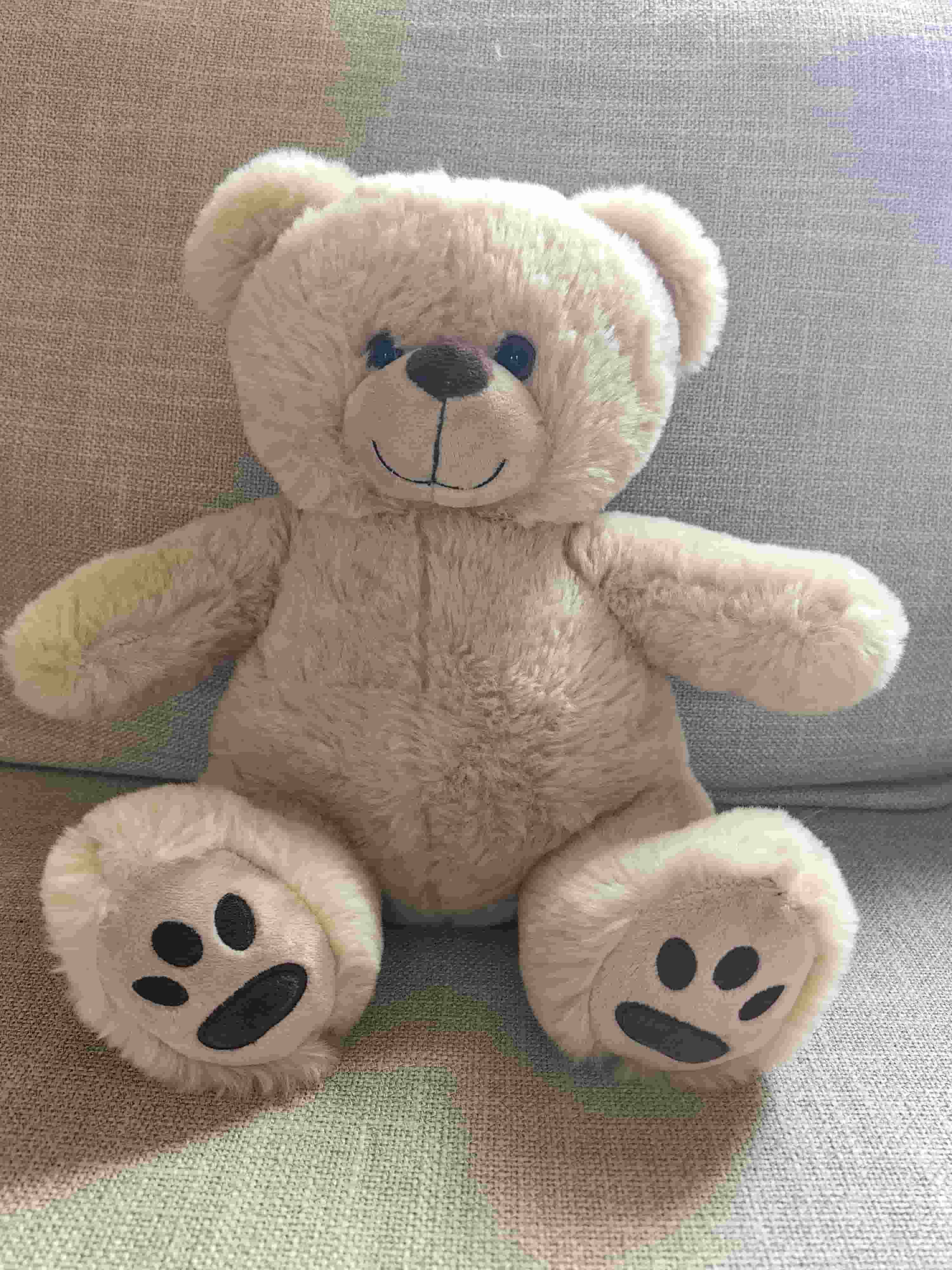 Beige stuffed bear toy